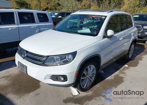 2014 Volkswagen Tiguan Sel z USA, uszkodzony, nr VIN WVGAV3AX2EW557592